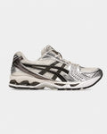 ASICS KAYANO 14 Noir et crème